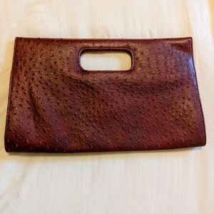 Free with purchase Charming Charlie large maroon clutch bag